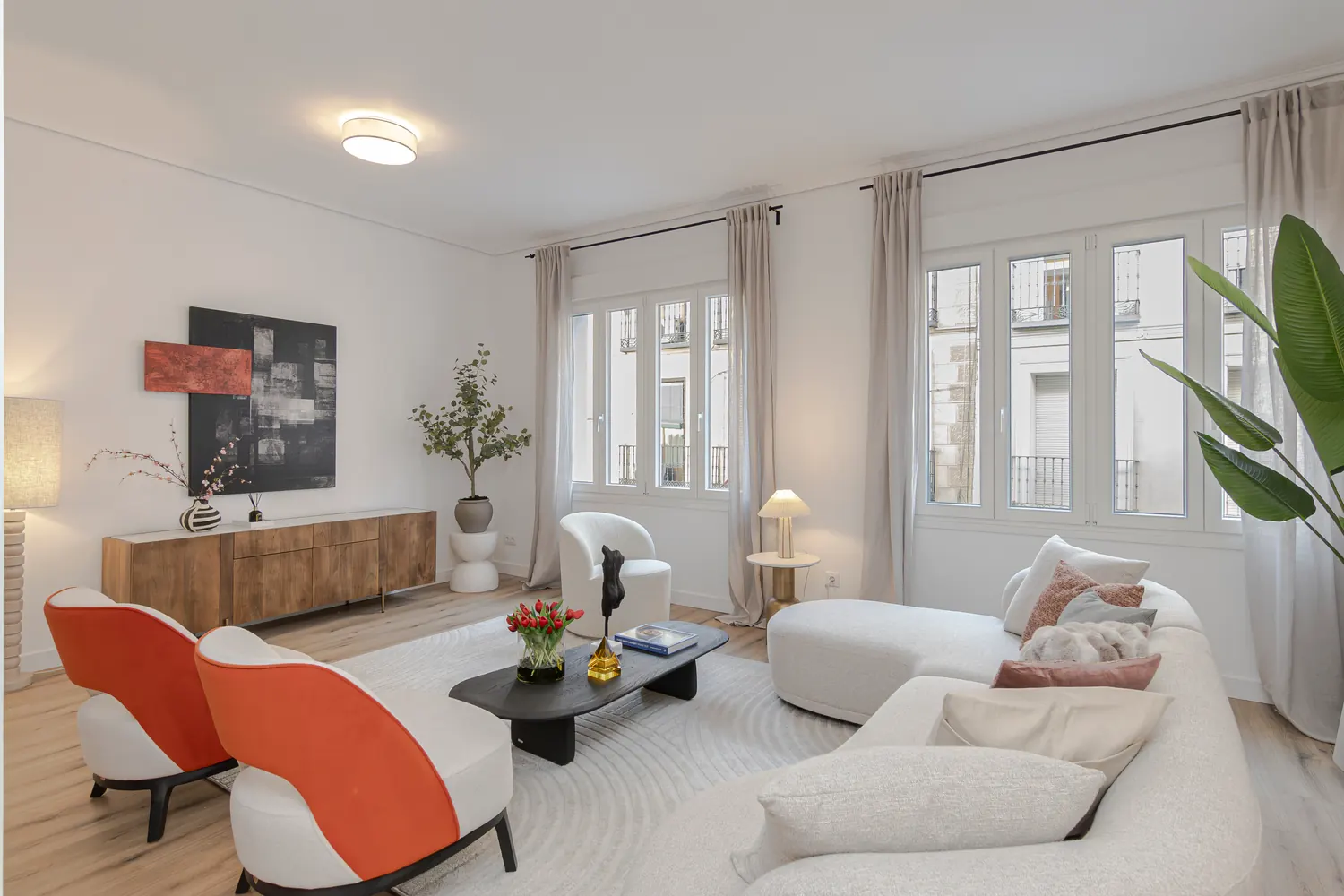 Warm interior composition with long daylight and natural material contrast.