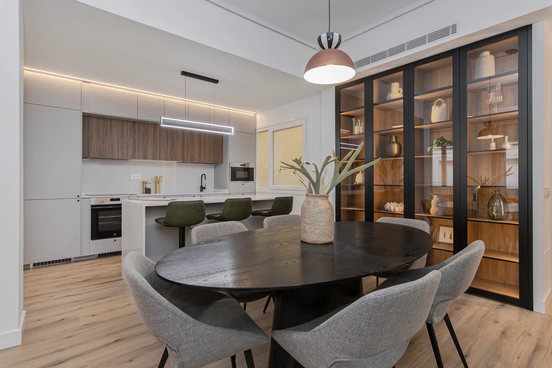 Finished dining and kitchen area used as evidence of value creation through delivery.